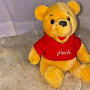 Disneyland plush 8” tall vintage Winnie the Pooh with red sweater